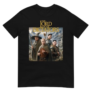 May include: Black t-shirt featuring a parody image with the text "THE LORD OF THE DICTATORS." The graphic depicts four figures in fantasy attire against a mountain backdrop. The shirt is made of a soft, comfortable material.