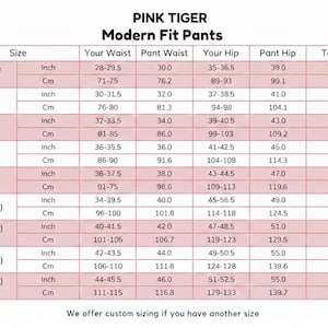 May include: A size chart for Pink Tiger Modern Fit Pants, showing waist, hip, and rise measurements in inches and centimetres. Sizes range from XS to 5XL. The chart includes the text "We offer custom sizing if you have another size."