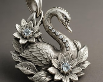 Collana con ciondolo a forma di cigno, ciondolo floreale a forma di uccello in argento con dettagli in pietra blu.