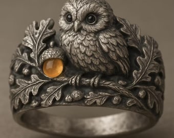 Eulenring, silbernes Eichenblatt- und Eichelband mit bernsteinfarbenem Cabochon-Akzent