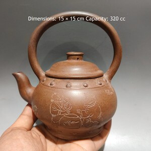 Yixing Yellow Duan Sand Zisha Teapot, Taiji Knob Lift Handle Pot 320cc