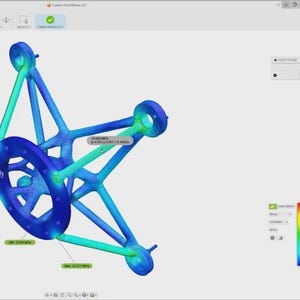 May include: A 3D computer-aided design model of a mechanical end effector component displayed in a software interface. The structure features a gradient color map ranging from blue to red, indicating stress distribution with numerical data points.
