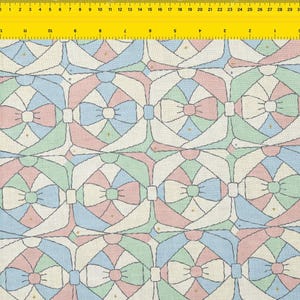 May include: A repeating pattern of pastel bows in pink, blue, and green, outlined in dark gray, on a cream-colored background. The bows are segmented with a stained-glass effect, and small gold stars are scattered throughout.