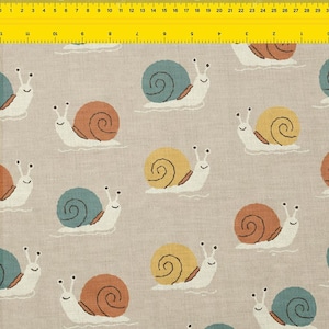 May include: A repeating pattern of cartoon snails in various colors, including teal, orange, and yellow, on a beige background. The snails have white bodies and are depicted with simple, smiling faces. The design is suitable for fabric or wallpaper.