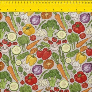 May include: A fabric pattern featuring a variety of colorful vegetables, including carrots, tomatoes, broccoli, peppers, onions, and cucumbers. The vegetables are arranged on a light gray background, creating a vibrant and detailed design.