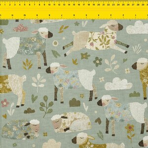 May include: Fabric with a repeating pattern of sheep in various poses. The sheep have white wool, brown faces and legs, and floral patterned coats in shades of blue, beige, and green. The background is a light green color with scattered floral and cloud motifs.