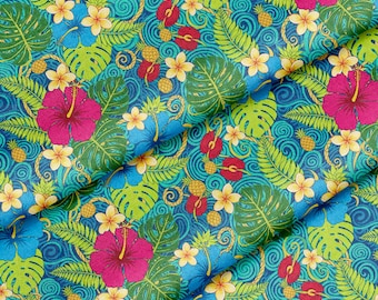 May include: Vibrant fabric featuring a tropical floral pattern. The design includes large pink hibiscus flowers, blue and yellow flowers, green leaves, and small pineapples against a swirling blue background. The fabric is suitable for various craft projects.