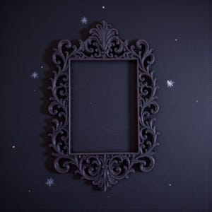 Ornate gothic baroque photo frame with intricate scrollwork and rectangular shape, styled as dramatic dark wall decor.