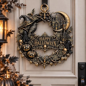 May include: A decorative Halloween wreath featuring a black and gold colour scheme. The wreath includes a central plaque with the text HAPPY HALLOWEEN, surrounded by sculpted elements like a raven, a witch hat, pumpkins, skulls, ghosts, and a castle.