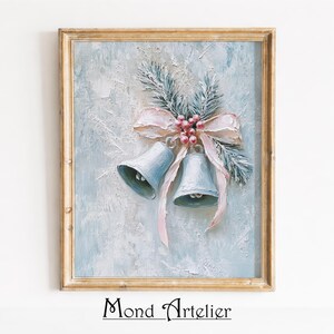 May include: An oil painting in a gold frame featuring two light blue bells tied with a pale pink ribbon and accented with pine needles and red berries. The background is a textured, icy blue and white impasto surface. Text reads Mond Artelier.