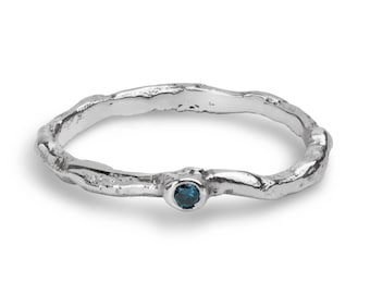 Organic Sterling Silver Ring With a Wavy Textured Band And A Blue Diamond | Nunki