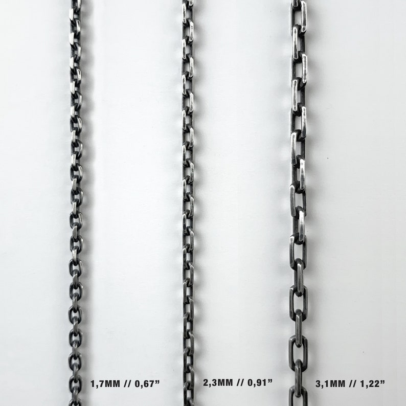 May include: Three silver chains of different thicknesses, shown side-by-side. The chains are 1.7mm, 2.3mm, and 3.1mm thick, or 0.67", 0.91", and 1.22" thick.