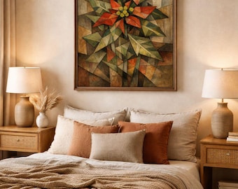 Puede incluir: Una pintura abstracta enmarcada de una flor de pascua en tonos rojos, verdes y marrones cuelga sobre una cama con ropa de cama y almohadas de tonos neutros. Dos lámparas a juego se encuentran en mesitas de noche de madera.
