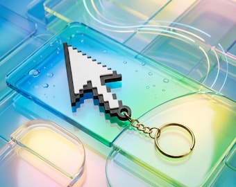 May include: A pixelated white and black cursor keychain with a gold-colored chain and ring. The cursor is resting on a clear, rectangular surface with a blue and green gradient. The background is a similar, abstract design.