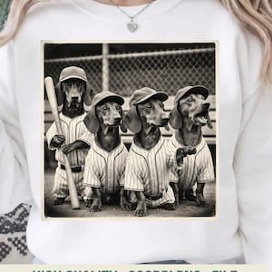 May include: A black and white image of a sweatshirt featuring a vintage-style illustration of four dachshunds in baseball uniforms and caps. One dog holds a bat. The text "HIGH QUALITY . 300DPI PNG . FILE" is at the bottom.