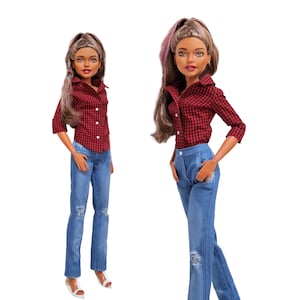 May include: A fashion doll with long brown hair styled in a high ponytail, wearing a red and black gingham button-down shirt with three-quarter sleeves and light blue denim jeans featuring distressed knee details and white strappy sandals.