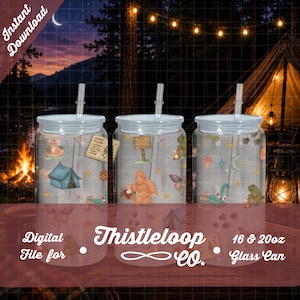 May include: Three clear glass cans with lids and straws, each featuring a wrap-around design of camping-themed illustrations including a blue tent, a brown sasquatch, mushrooms, butterflies, and a sign. The text reads Instant Download and Thistleloop CO.