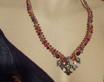 Silver cross pendant choker with peridot, carnelians, citrines, amethyst gemstones and micro macrame cord