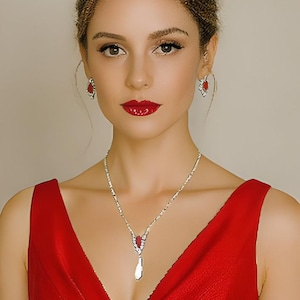 Vintage unworn pearl and ruby rhinestone necklace and earrings set simulated gemstones