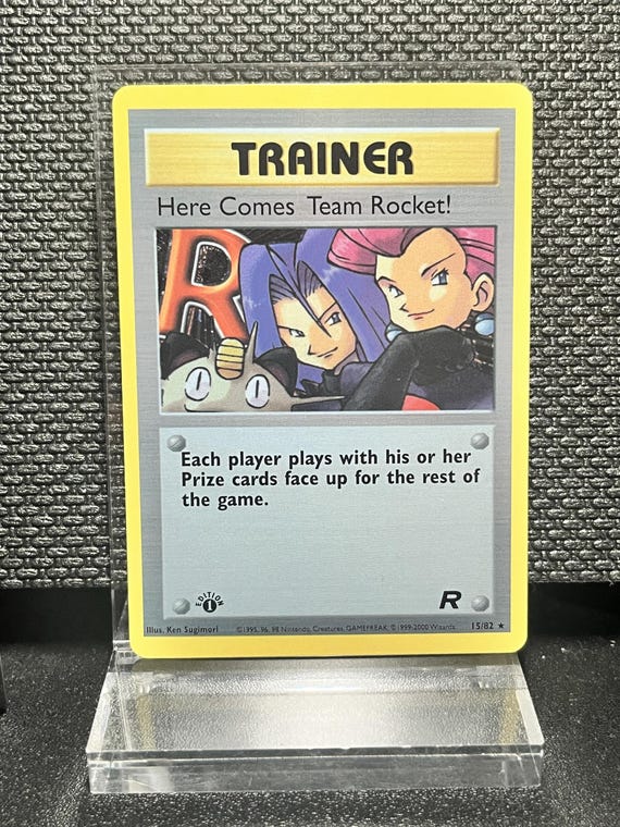 Here Comes Team Rocket 15/82 1st Edition Holofoil Proxy Card – Team Rocket Trainer Card – BaseSet Era Pokémon Display Collectible