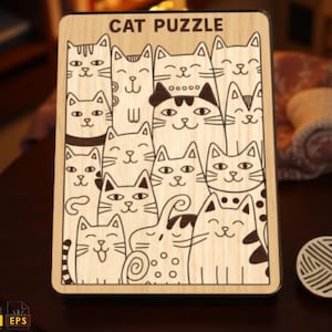 May include: Wooden cat puzzle with the words "CAT PUZZLE" at the top. The puzzle features a collection of smiling cat faces in a black and white line drawing style. A white yarn ball is next to the puzzle.