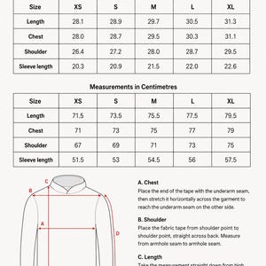 May include: A size guide chart for a garment, featuring two tables with measurements in inches and centimetres for sizes XS through XL. It includes a line drawing of a hoodie with labels A, B, C, and D, and corresponding instructions for measuring chest, shoulder, length, and sleeve length.