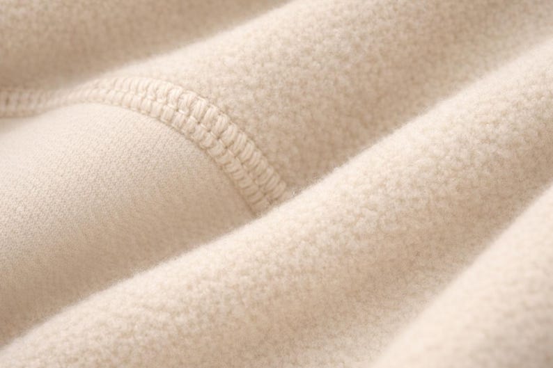Heavyweight brushed fleece cotton fabric close up soft textured material for premium sweatpants
