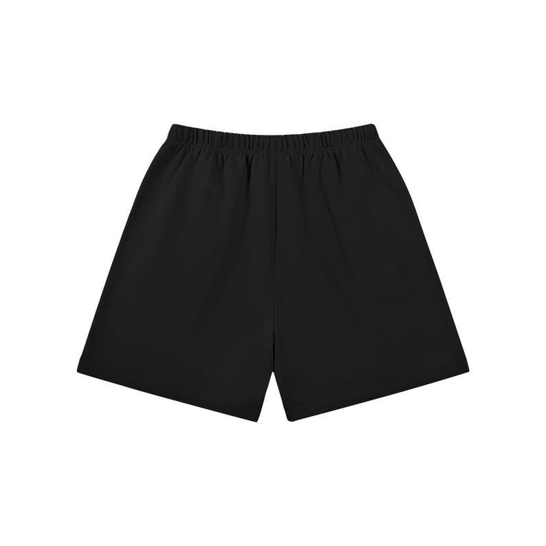 May include: Black athletic shorts with an elasticated waistband. The shorts are made of a soft, opaque material. The shorts are a solid black colour and are suitable for various activities.