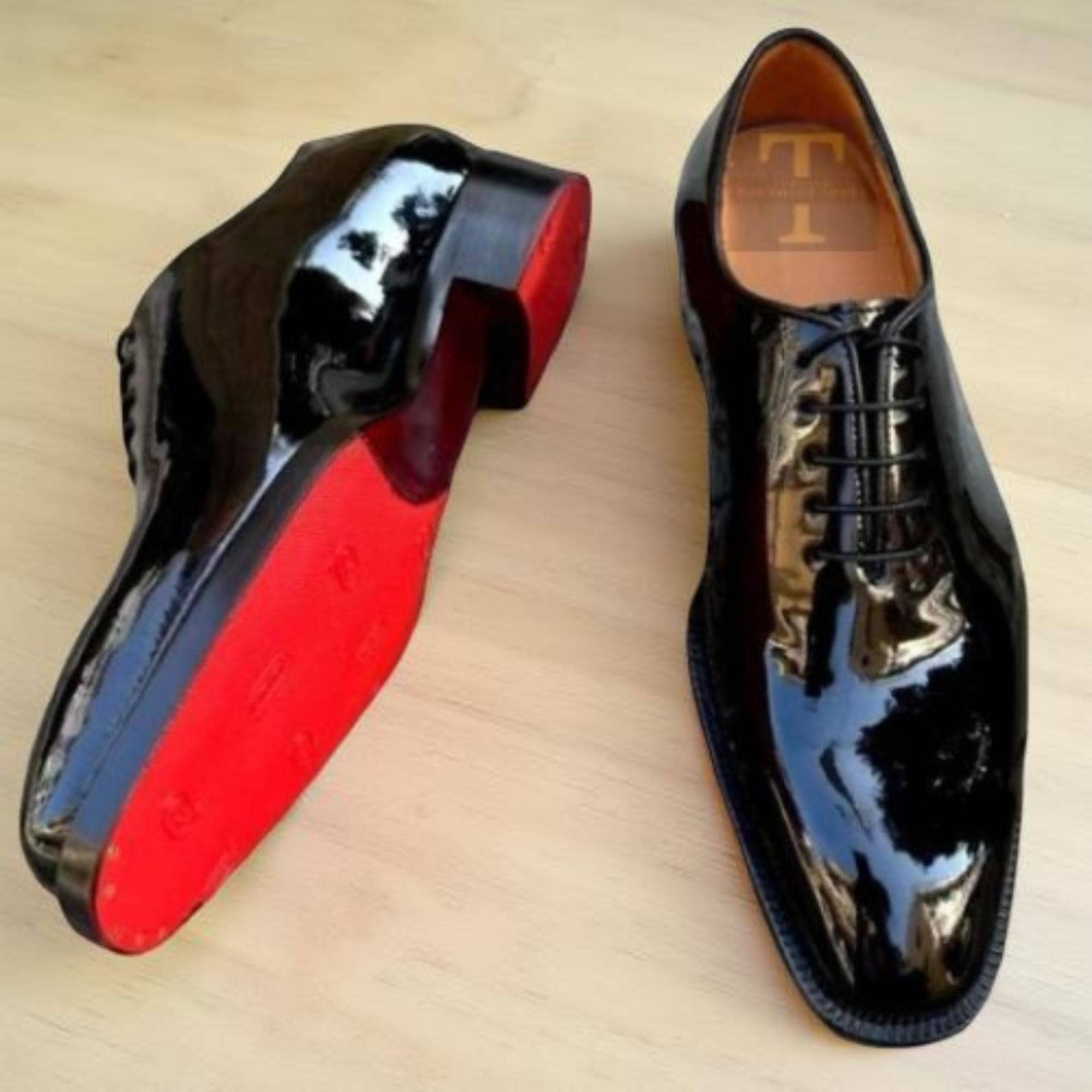 Christian Louboutin Black Patent Leather Loafers With Red 