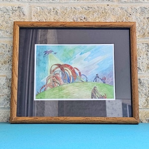 May include: Watercolor painting in a wooden frame. The artwork depicts a colorful abstract landscape with figures and birds. The painting features red, blue, and green hues, with a light blue sky. The frame is a light brown color.