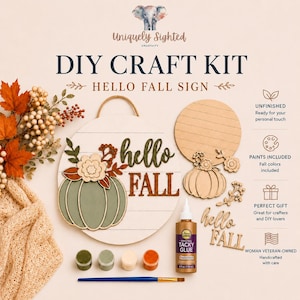 May include: A DIY craft kit for a Hello Fall sign, including a round wooden board, laser-cut pumpkin and floral shapes, four small paint pots, a bottle of Tacky Glue, and a paintbrush. The kit features text reading Hello Fall and Uniquely Sighted.