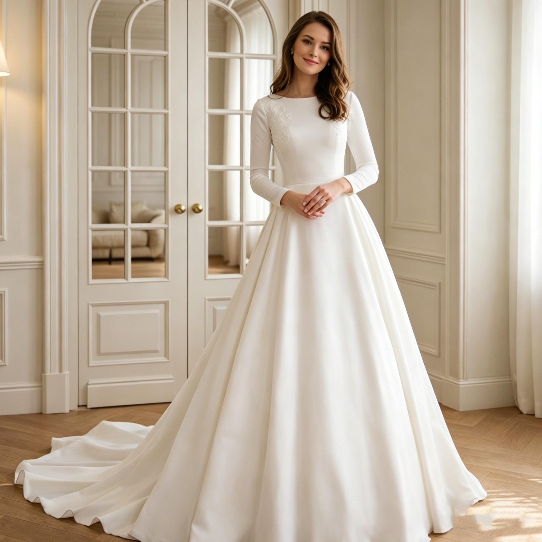 Robe de mariée minimaliste en satin manches longues dos nu