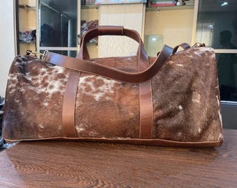 Bolsa de viaje y fin de semana de piel de vacuno con pelo – Piel auténtica