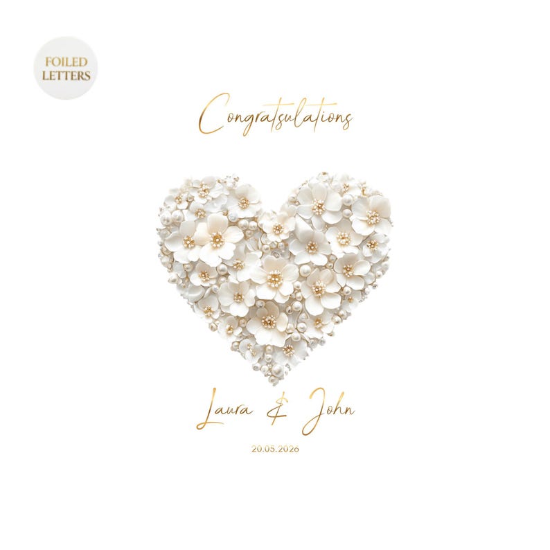A white greeting card with a heart shape made of small white flowers and pearls, with gold foil text reading "Congratulations" above and "Laura & John 20.05.2026" below, on a white background.