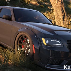 Pode incluir: Uma carrinha cinzenta com detalhes em preto, incluindo um capô e para-choques dianteiro pretos. O carro tem rodas personalizadas com pinças de travão vermelhas. O texto "Kugothaboss" é visível no canto inferior direito.