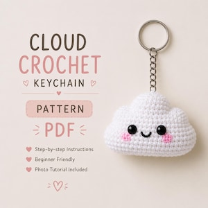 May include: A white crochet cloud keyring with black eyes and pink cheeks, attached to a silver keyring and chain. The image includes text that reads "CLOUD CROCHET KEYCHAIN PATTERN PDF". The pattern includes step-by-step instructions, is beginner friendly, and includes a photo tutorial.