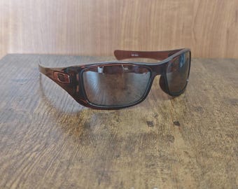 Gafas de sol deportivas polarizadas Oakley HIJINX 12-928 de acetato, fabricadas en EE. UU. 64/15