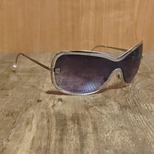 Vintage chanel shield sunglasses - Etsy 日本
