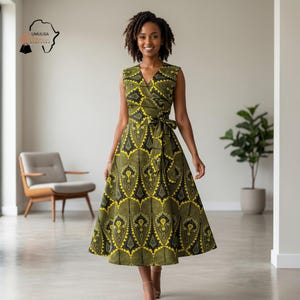 May include: A sleeveless wrap dress with a V-neckline and a tie at the waist. The dress features a yellow, black, and green geometric pattern. The dress is knee-length and has a flared skirt. The dress is made of a lightweight fabric.