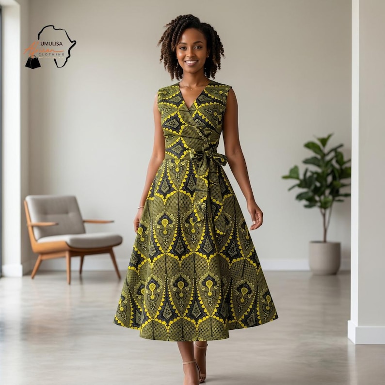 May include: A sleeveless wrap dress with a V-neckline and a tie at the waist. The dress features a yellow, black, and green geometric pattern. The dress is knee-length and has a flared skirt. The dress is made of a lightweight fabric.