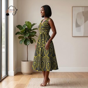 May include: A sleeveless, knee-length dress with a V-neck and a fitted waist. The dress features a yellow and black geometric pattern. The dress is made of a lightweight fabric and is suitable for warm weather. The dress is part of the African clothing collection.