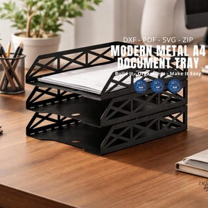 May include: A black metal three-tier document tray with a geometric lattice side pattern. The text reads: DXF - PDF - SVG - ZIP, MODERN METAL A4 DOCUMENT TRAY, Build It - Organize It - Make It Easy. Includes SVG, ZIP, and DXF icons.