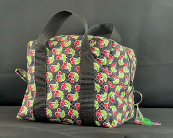 Cherry Bag can be used to store makeup, toiletries , art supplies, toys and books.