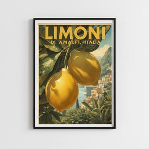 May include: A framed vintage-style poster featuring two ripe lemons hanging from a branch. The poster has the text "LIMONI DI AMALFI, ITALIA" in gold lettering. The background shows a coastal town with buildings and the sea.