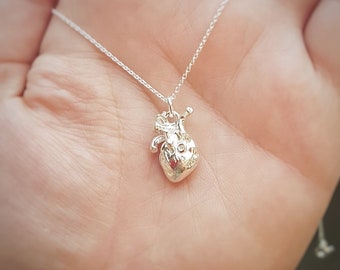 Human Heart Pendant Necklace in Silver