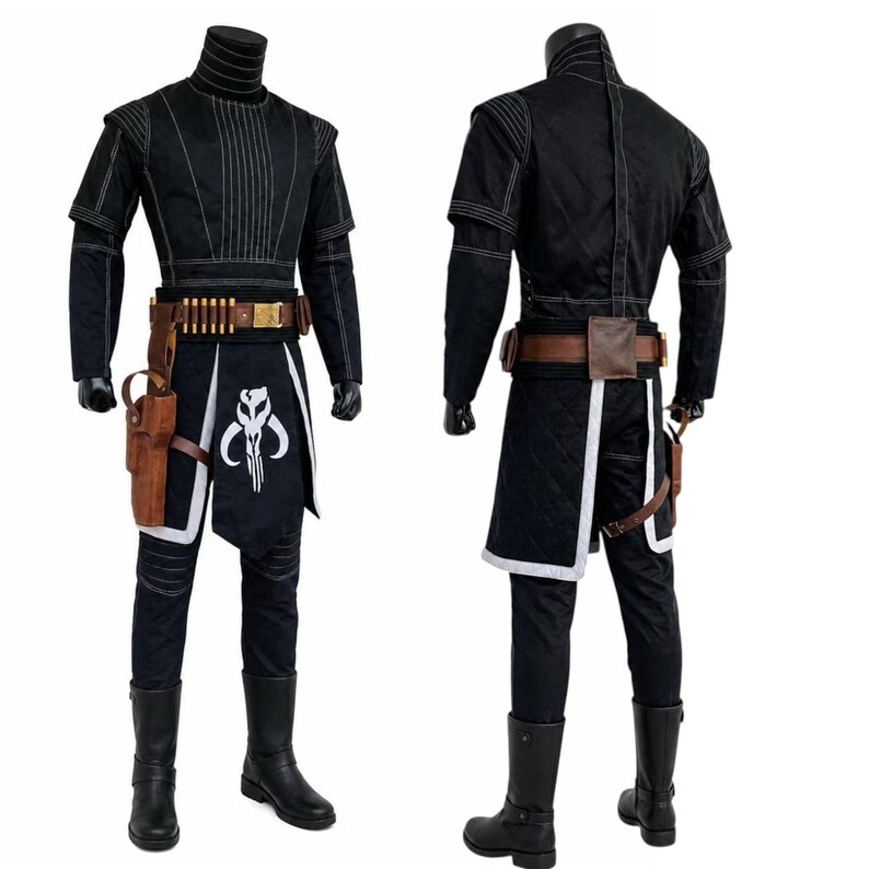 May include: Black costume with white stitching, featuring a high-collared top, short sleeves, and matching pants. A brown belt with ammunition and a holster, plus a black and white graphic on the skirt. Black boots complete the outfit.