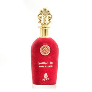 May include: A red perfume bottle with a gold-colored ornate top. The bottle has the words "Rose Elixir" in English and Arabic. The brand name "AYAT" is also visible on the bottle.