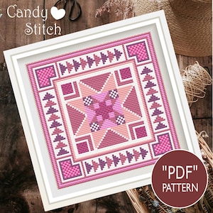 Puede incluir: Un patrón de punto de cruz enmarcado con un diseño geométrico en tonos de rosa y morado. La obra de arte presenta un motivo de estrella central rodeado de cuadrados y triángulos. El texto "Candy Stitch" y "PDF PATTERN" son visibles.