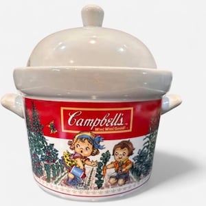 May include: A white ceramic Campbell's soup bowl with a lid. The bowl has a red band with the Campbell's logo and a graphic of children in a garden. The bowl has two handles and a small knob on the lid.
