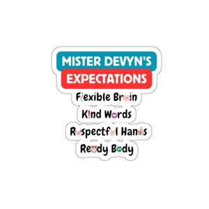 May include: A white sticker with the text "MISTER DEVYN'S EXPECTATIONS" in blue and red. Below, it lists "Flexible Brain," "Kind Words," "Respectful Hands," and "Ready Body" in a playful font, with small illustrations.